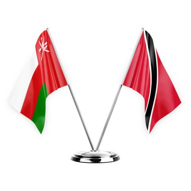 Two table flags isolated on white background 3d illustration, oman and tobago