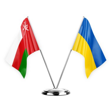 Two table flags isolated on white background 3d illustration, oman and ukraine