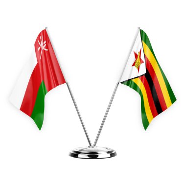 Two table flags isolated on white background 3d illustration, oman and zimbabwe