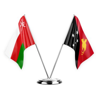 Two table flags isolated on white background 3d illustration, oman and papua new guinea