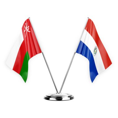 Two table flags isolated on white background 3d illustration, oman and paraguay