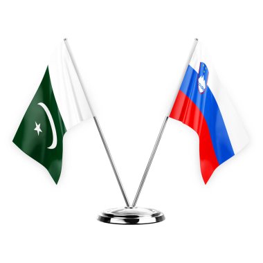 Two table flags isolated on white background 3d illustration, pakistan and slovenia