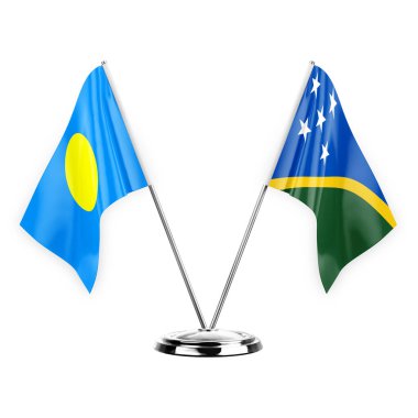 Two table flags isolated on white background 3d illustration, palau and solomon islands