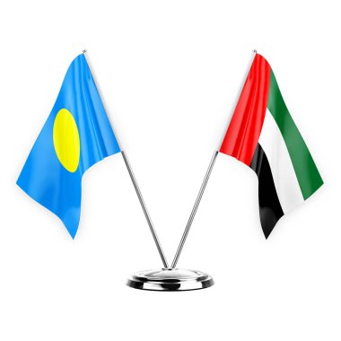 Two table flags isolated on white background 3d illustration, palau and united arab emirates