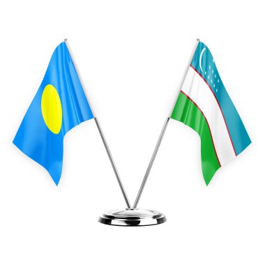Two table flags isolated on white background 3d illustration, palau and uzbekistan