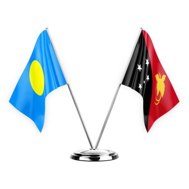 Two table flags isolated on white background 3d illustration, palau and papua new guinea