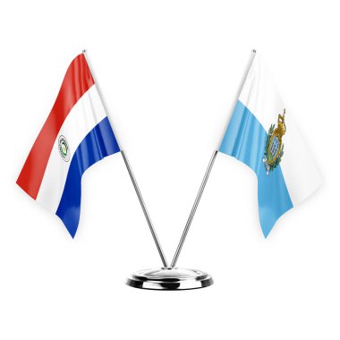 Two table flags isolated on white background 3d illustration, paraguay and san marino