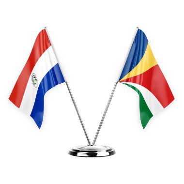 Two table flags isolated on white background 3d illustration, paraguay and seychelles