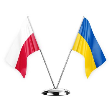 Two table flags isolated on white background 3d illustration, poland and ukraine