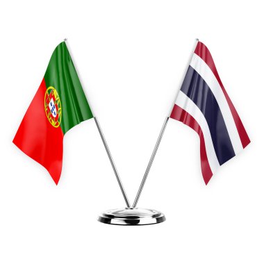 Two table flags isolated on white background 3d illustration, portugal and thailand