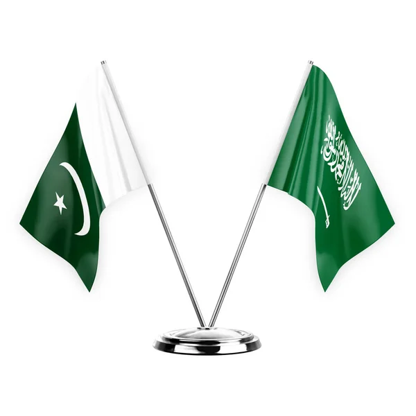 白の背景の3Dイラストに隔離された2つのテーブルフラグ パキスタンとサウジアラビア — ストック写真