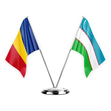 Two table flags isolated on white background 3d illustration, romania and uzbekistan