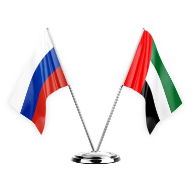 Two table flags isolated on white background 3d illustration, russia and united arab emirates