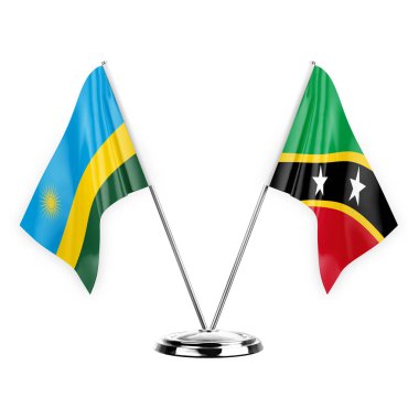 Two table flags isolated on white background 3d illustration, rwanda and saint kitts and venis