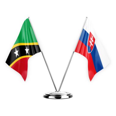 Two table flags isolated on white background 3d illustration, saint kitts and venis and slovakia