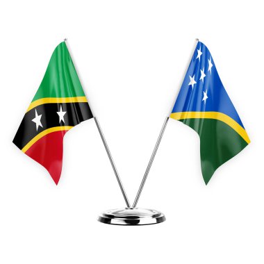 Two table flags isolated on white background 3d illustration, saint kitts and venis and solomon islands