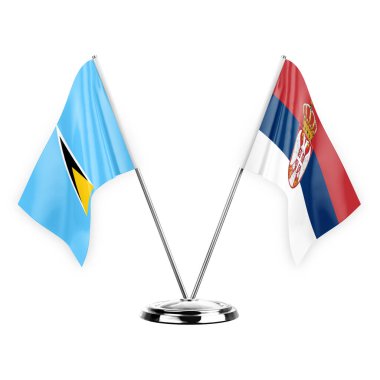 Two table flags isolated on white background 3d illustration, saint lucia and serbia