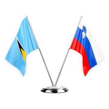 Two table flags isolated on white background 3d illustration, saint lucia and slovenia