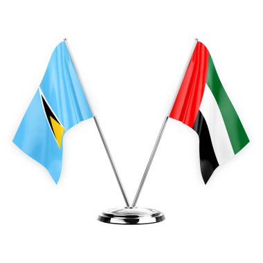 Two table flags isolated on white background 3d illustration, saint lucia and united arab emirates