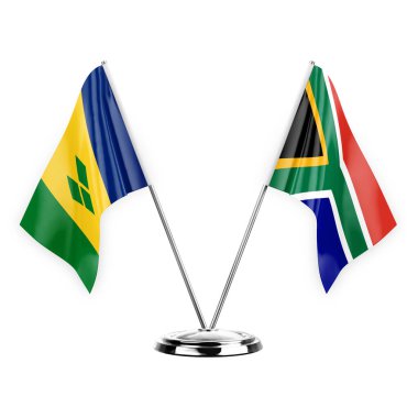Two table flags isolated on white background 3d illustration, saint vincent and the grenadines and south africa