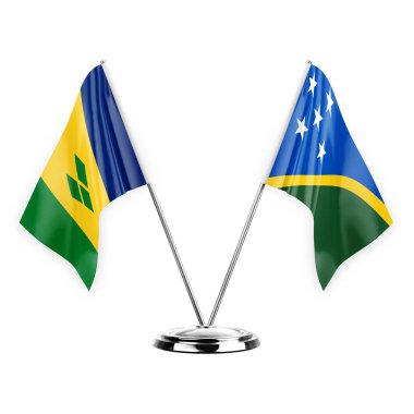 Two table flags isolated on white background 3d illustration, saint vincent and the grenadines and solomon islands