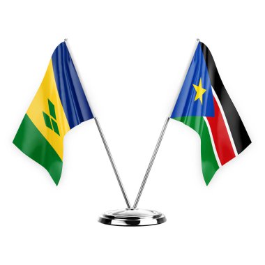 Two table flags isolated on white background 3d illustration, saint vincent and the grenadines and south sudan