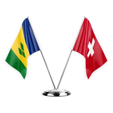 Two table flags isolated on white background 3d illustration, saint vincent and the grenadines and switzerland