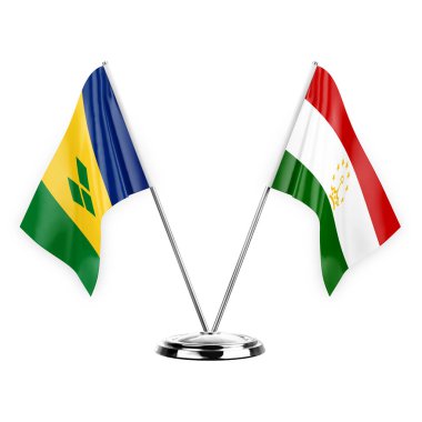 Two table flags isolated on white background 3d illustration, saint vincent and the grenadines and tajikistan