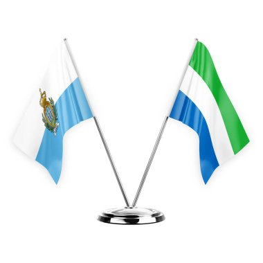 Two table flags isolated on white background 3d illustration, san marino and sierra leone