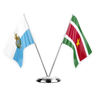 Two table flags isolated on white background 3d illustration, san marino and suriname