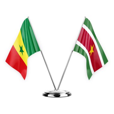 Two table flags isolated on white background 3d illustration, senegal and suriname