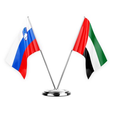 Two table flags isolated on white background 3d illustration, slovenia and united arab emirates