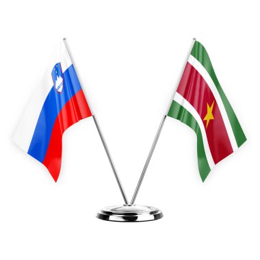 Two table flags isolated on white background 3d illustration, slovenia and suriname