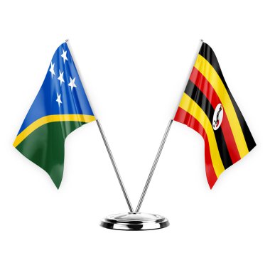 Two table flags isolated on white background 3d illustration, solomon islands and uganda