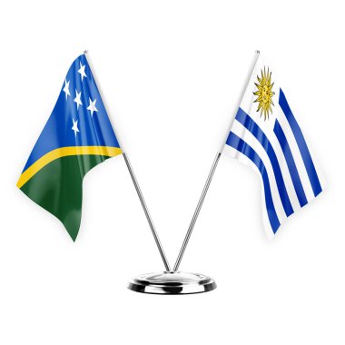 Two table flags isolated on white background 3d illustration, solomon islands and uruguay