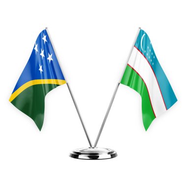 Two table flags isolated on white background 3d illustration, solomon islands and uzbekistan