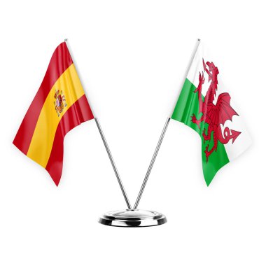Two table flags isolated on white background 3d illustration, spain and wales