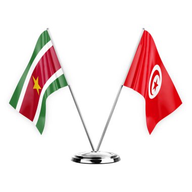 Two table flags isolated on white background 3d illustration, suriname and tunisia
