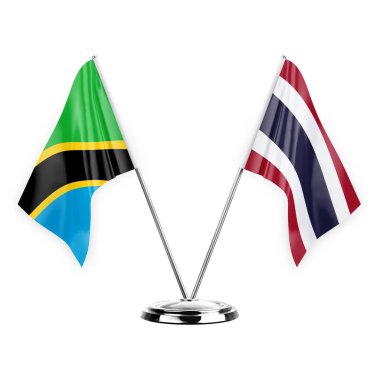 Two table flags isolated on white background 3d illustration, tanzania and thailand