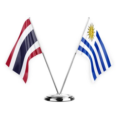 Two table flags isolated on white background 3d illustration, thailand and uruguay