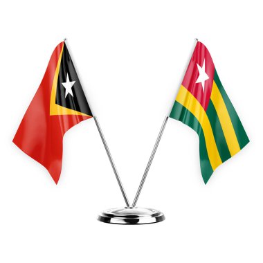 Two table flags isolated on white background 3d illustration, timor leste and togo