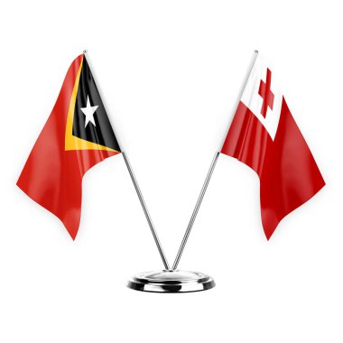 Two table flags isolated on white background 3d illustration, timor leste and tonga