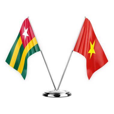 Two table flags isolated on white background 3d illustration, togo and vietnam