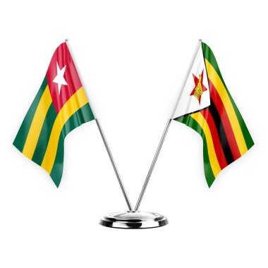 Two table flags isolated on white background 3d illustration, togo and zimbabwe