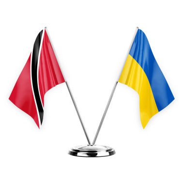 Two table flags isolated on white background 3d illustration, trinidad tobago and ukraine