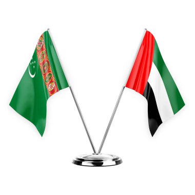Two table flags isolated on white background 3d illustration, turkmenistan and united arab emirates