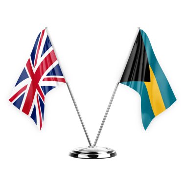 Two table flags isolated on white background 3d illustration, united kingdom and bahamas