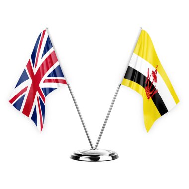 Two table flags isolated on white background 3d illustration, united kingdom and brunei