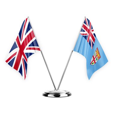 Two table flags isolated on white background 3d illustration, united kingdom and fiji