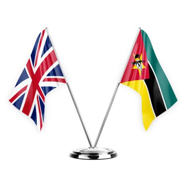Two table flags isolated on white background 3d illustration, united kingdom and mozambique